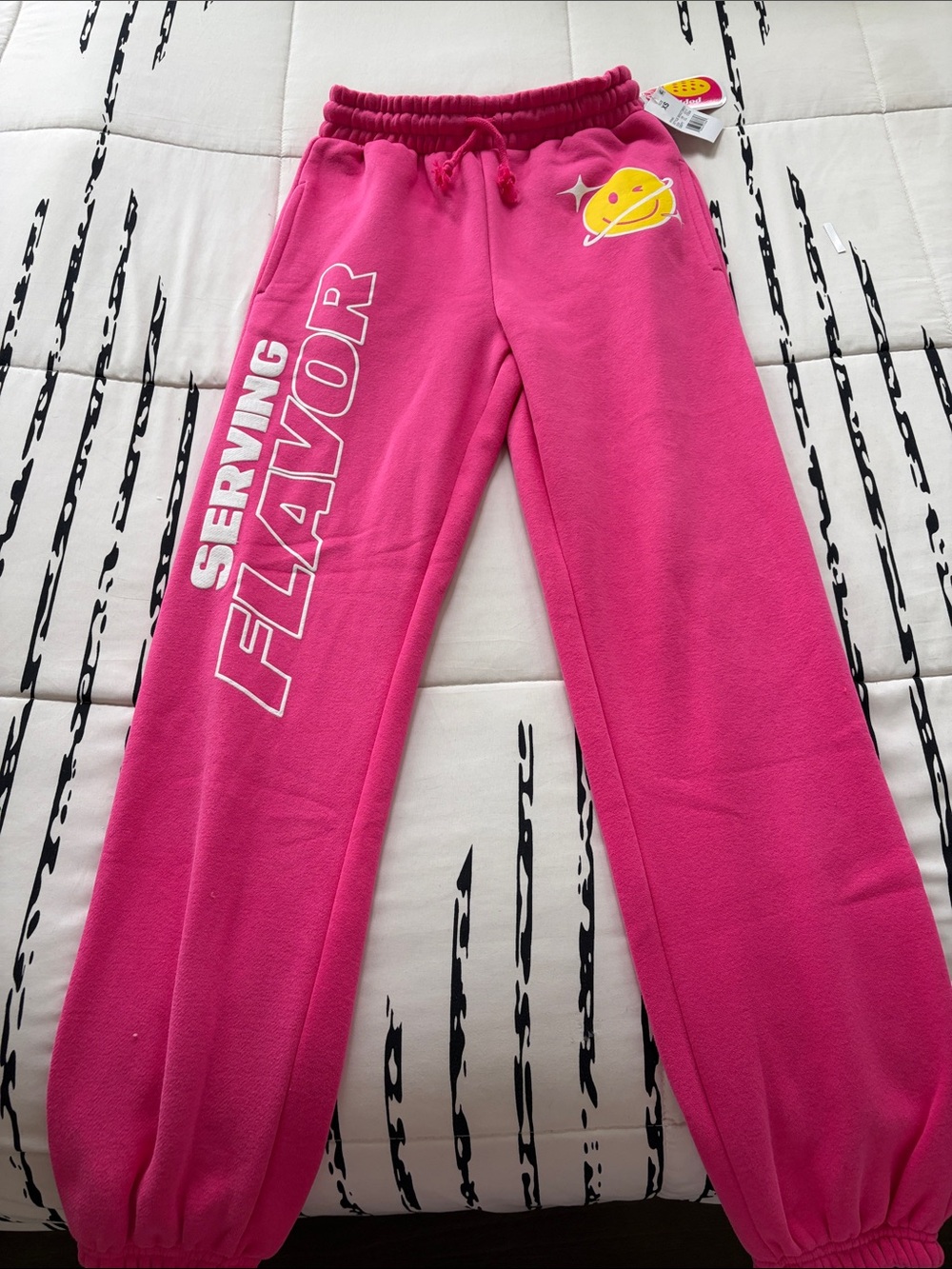Women’s Pink Fleece Joggers with 'Serving Flavor' Graphic